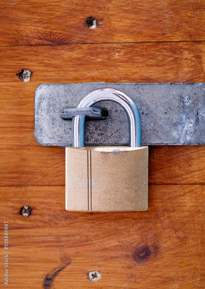 Fototapeta premium Lock on wooden door