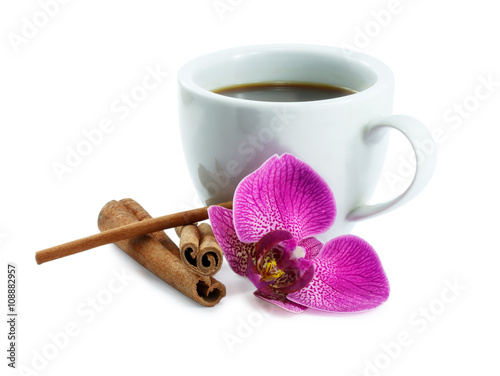 Coffee and orchid isolated on a white background