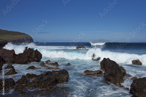 Waves coming ashore on the rocky coast of Easter Island (Papa Nui) in the Pacific Ocean