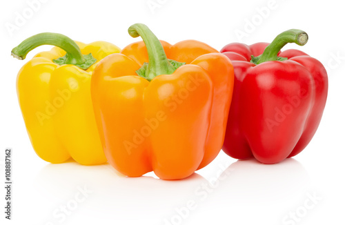 yellow, orange and red peppers on white background