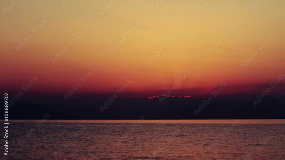 The sun in heart shape rising over the sea- timelapse The sun in heart shape rising over the sea- timelapse