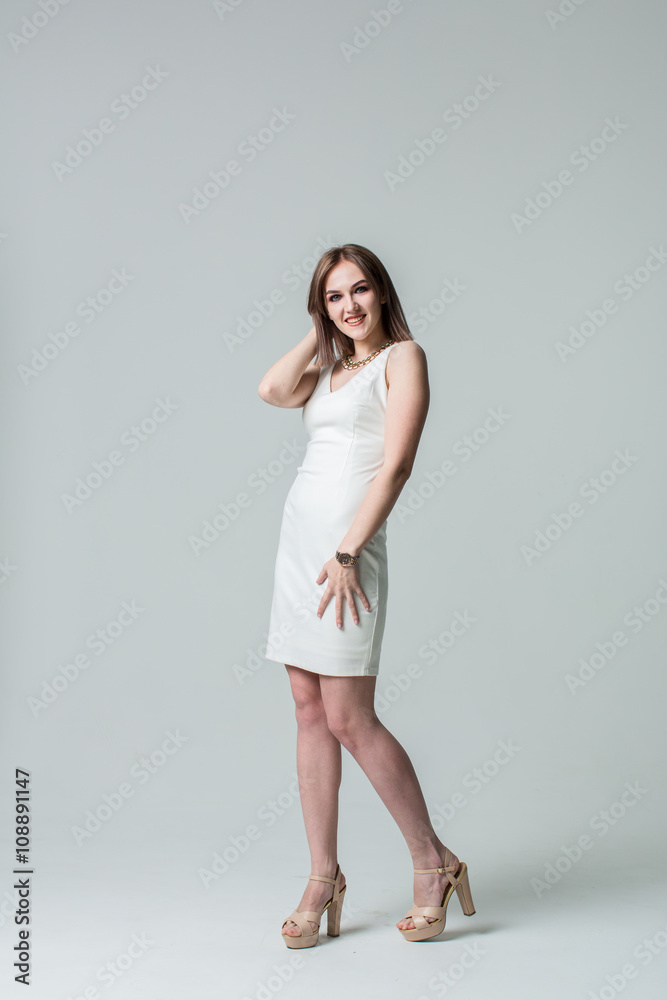 Beautiful caucasian woman on light grey background