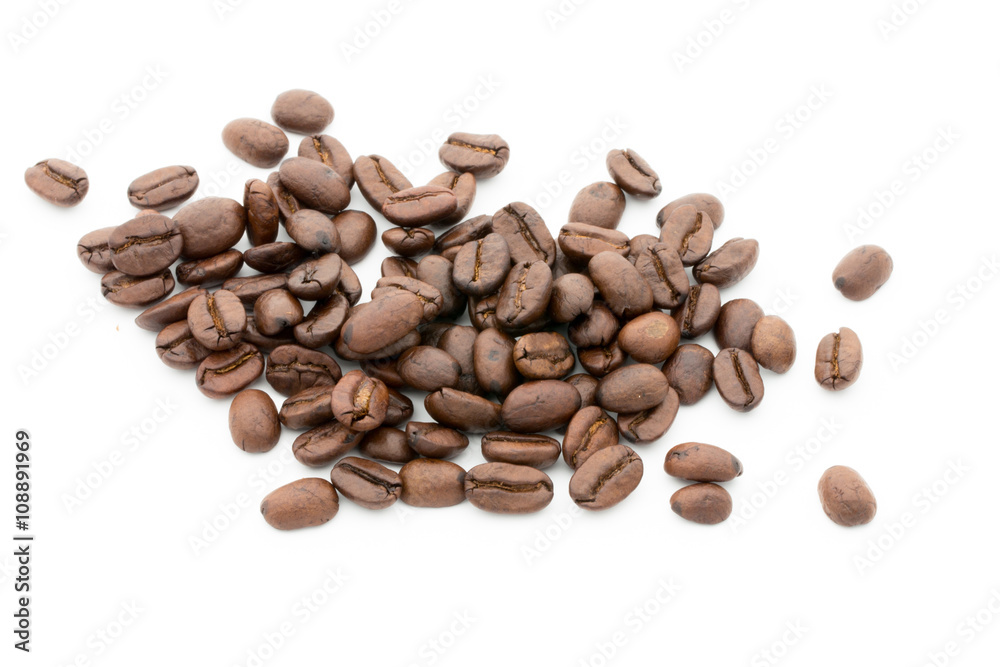 Coffee grains and leaves isolated on the white backgrounds. Coffee grains and leaves isolated on the white backgrounds.
