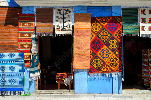Canvas Print Wall of a local store with traditional Mexican handmade carpets