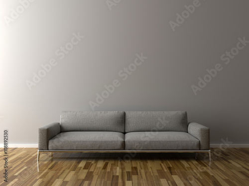 Sofa in empty room, parquet on the floor.