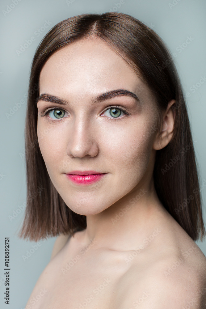 Beauty portrait of young model with middle length hair. Professional nude makeup. Green eyes. Beauty portrait of young model with middle length hair. Professional nude makeup. Green eyes.