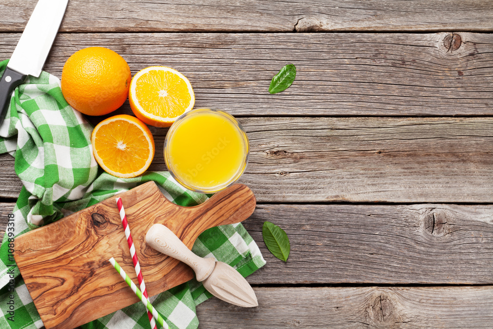 Fresh ripe oranges and juice Fresh ripe oranges and juice