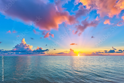 Colorful sunrise over ocean on Maldives © sborisov