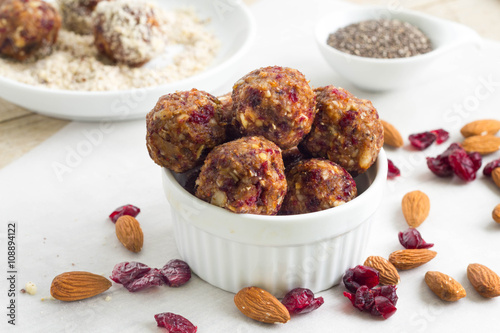 Raw, vegan energy balls with dried fruit and nuts. Healthy snack idea.