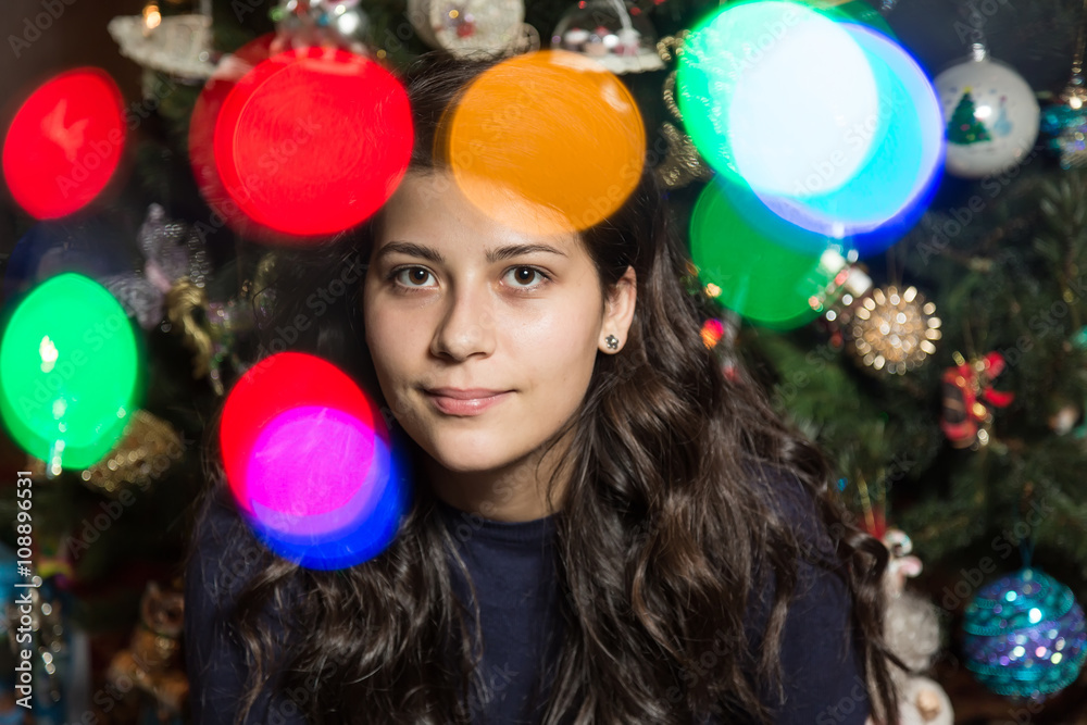 Smiling girl with Christmas tree Smiling girl with Christmas tree