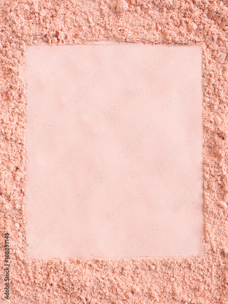 Extruded frame in a foundation cosmetic powder
