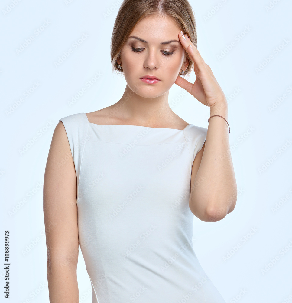 Woman with a headache holding head, isolated on white background Woman with a headache holding head, isolated on white background