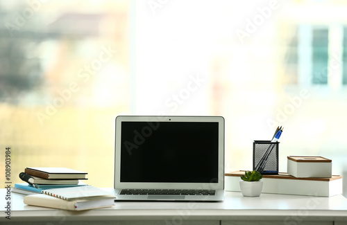 Laptop on the table in the ...