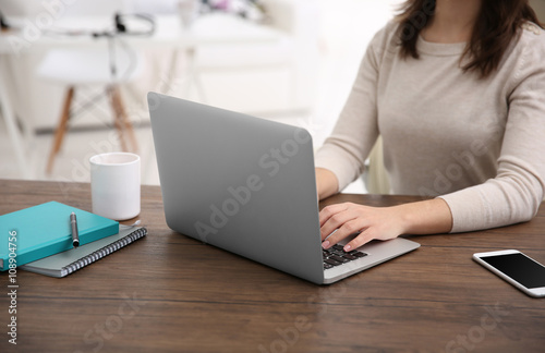 Work concept. Woman using laptop