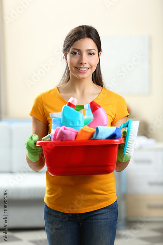Beautiful woman with basin ...
