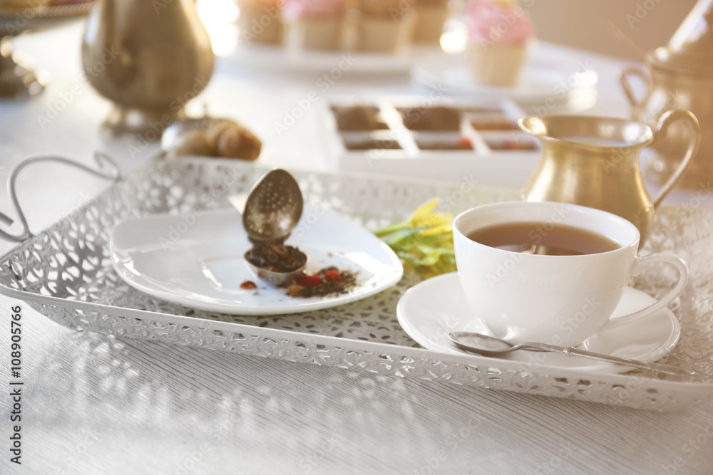 Delicious tea and cakes on wooden table, closeup Delicious tea and cakes on wooden table, closeup