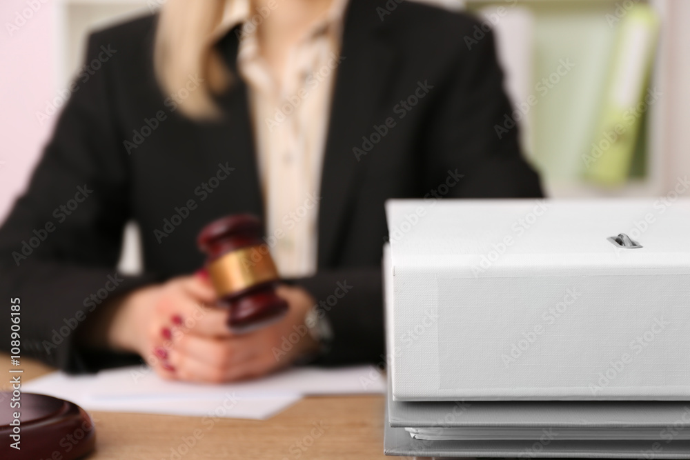 Young female judge working in her office Young female judge working in her office