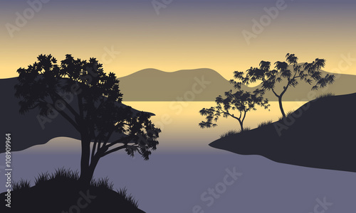 Silhouette of hills and tree at the morning