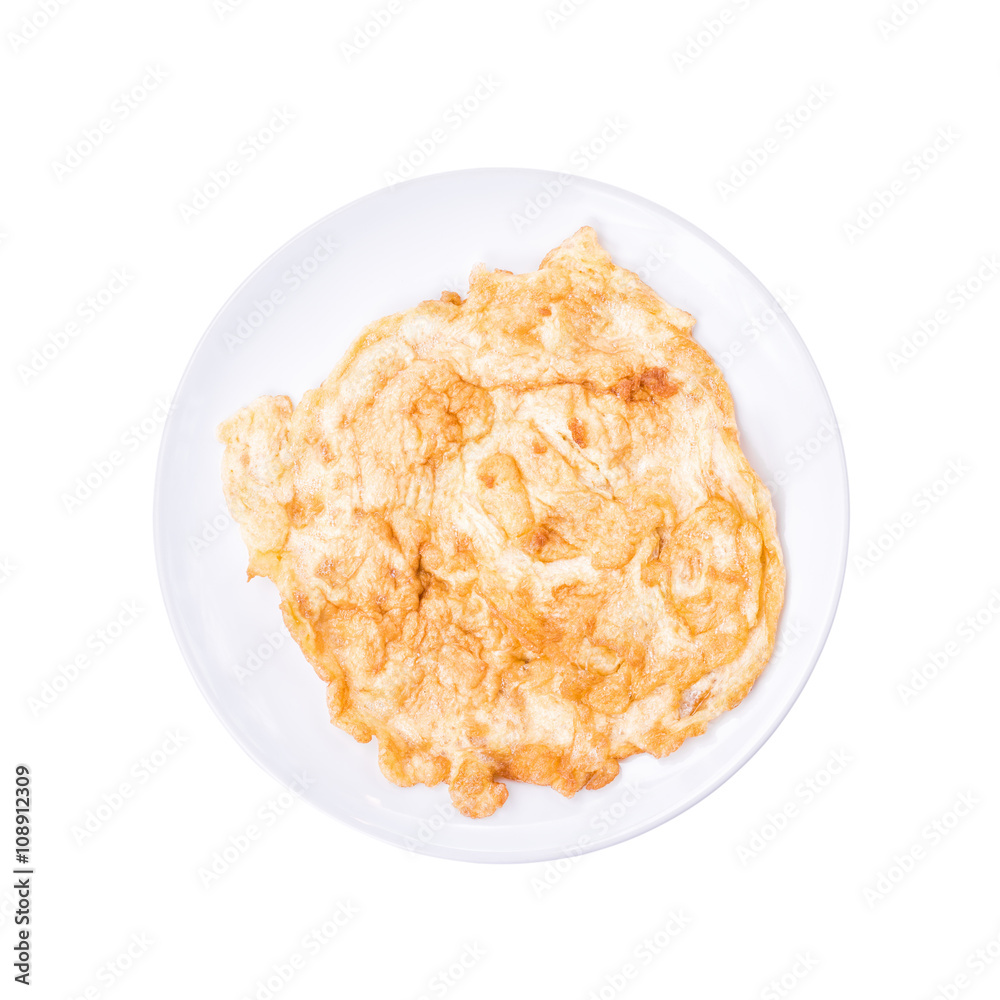 Close-up of omelette with plate isolated on a white background Close-up of omelette with plate isolated on a white background