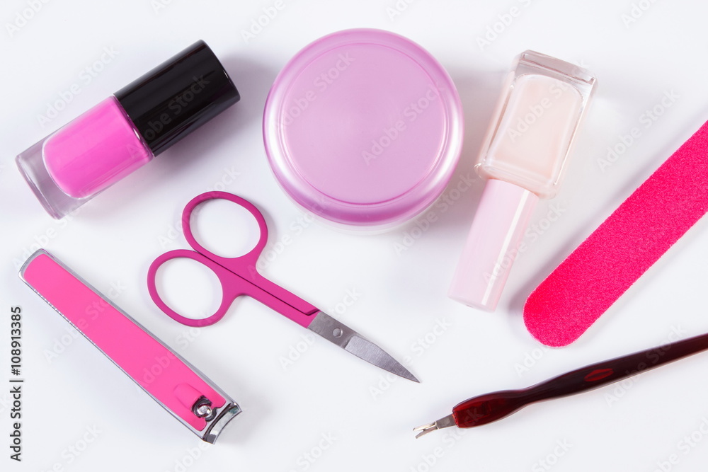 Cosmetics and set of manicure or pedicure tools, concept of nail care Cosmetics and set of manicure or pedicure tools, concept of nail care
