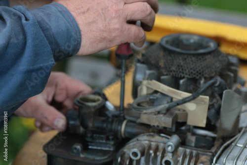 repairing lawn mower engine