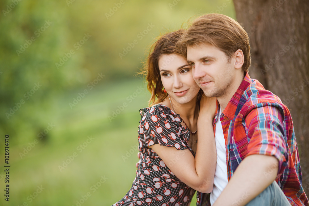 Fototapeta premium Loving couple on a meadow