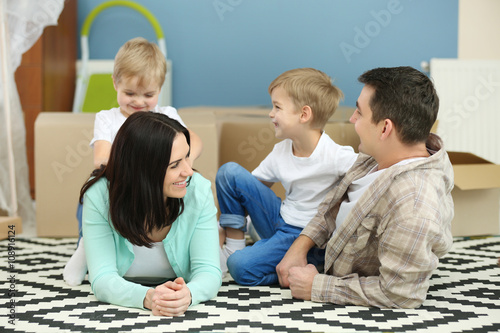 Moving concept. Happy famil...