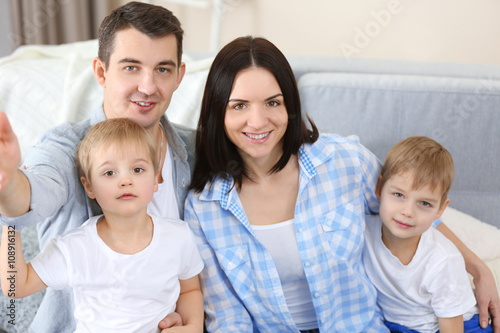 Happy family making selfie ...