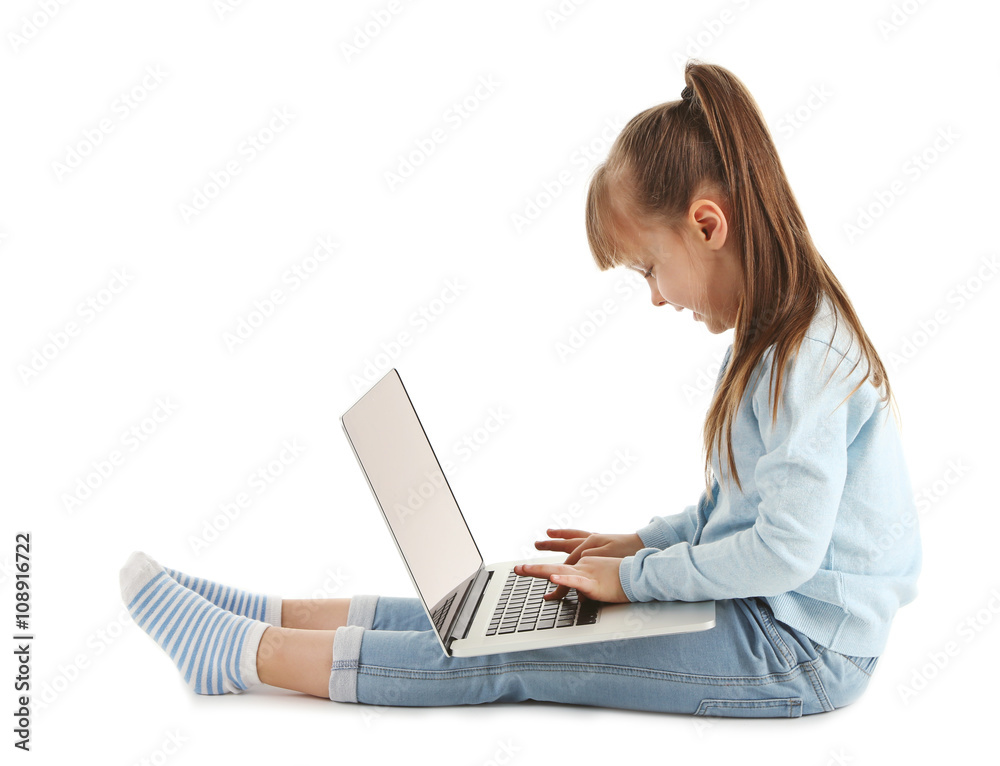 Little girl with laptop isolated on white Little girl with laptop isolated on white