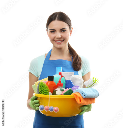 Young woman holding cleanin...