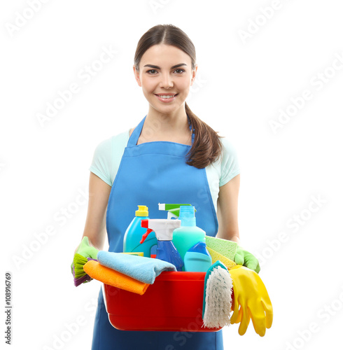 Young woman holding cleanin...