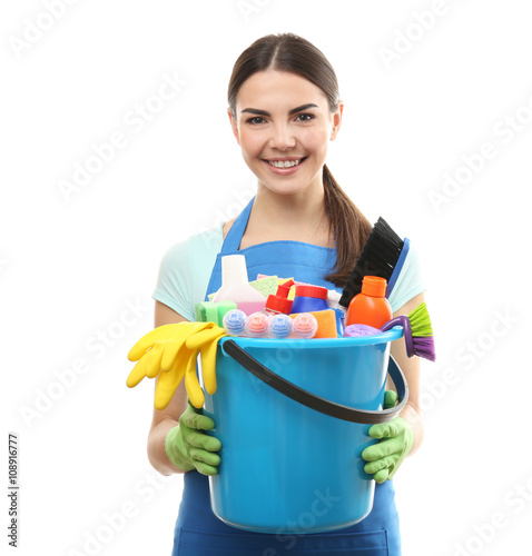 Young woman holding cleanin...