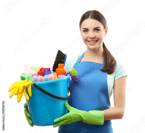 Young woman holding cleanin...