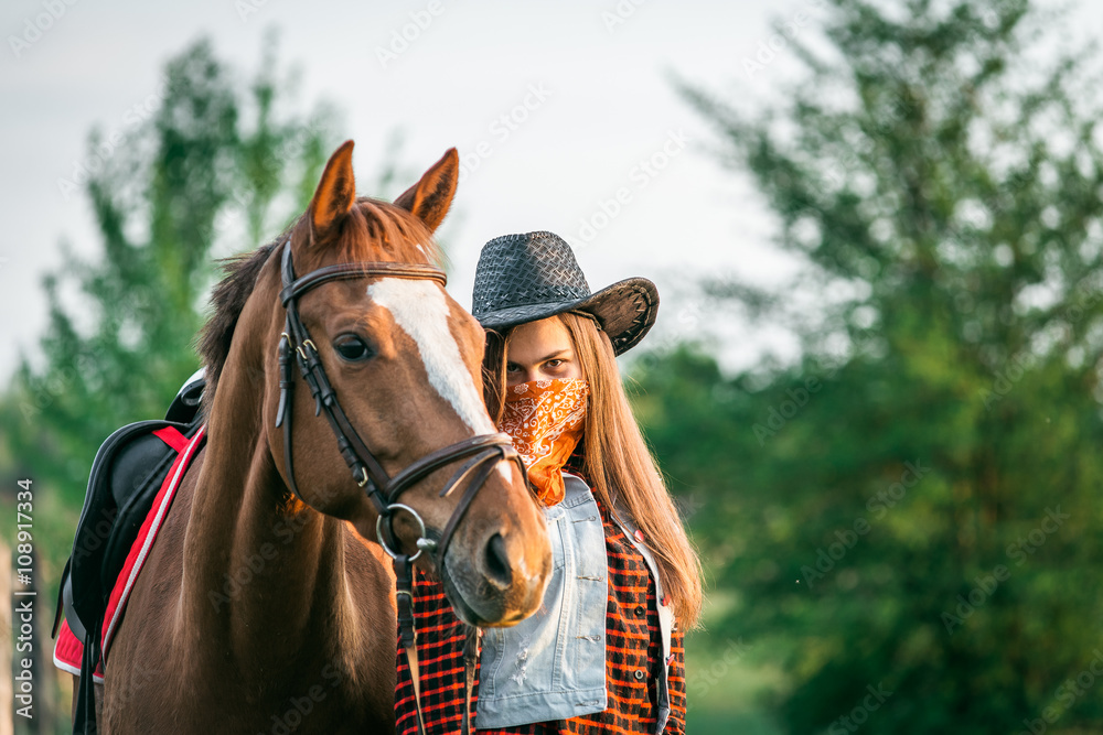 Obraz premium cowgirl and horse