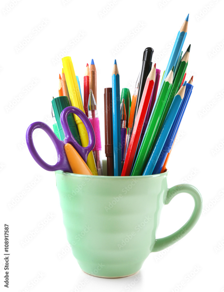 Colorful stationery in green cup, isolated on white Colorful stationery in green cup, isolated on white
