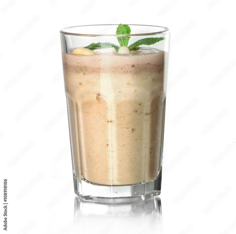 Fresh banana cocktail with chocolate and peanuts nuts on cutting board Fresh banana cocktail with chocolate and peanuts nuts on cutting board