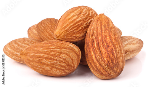 heap of almonds isolated on white background