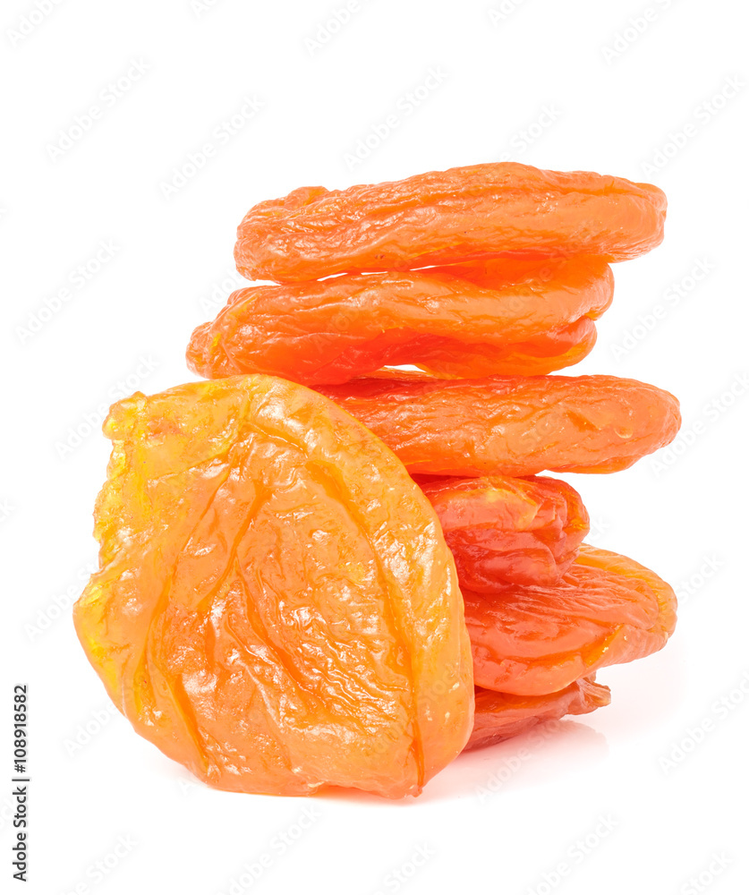 heap of dried apricots isolated on white background closeup heap of dried apricots isolated on white background closeup