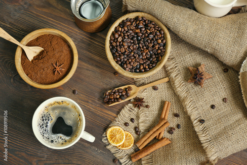 Coffee with beans and spices on wooden table, top view © Africa Studio