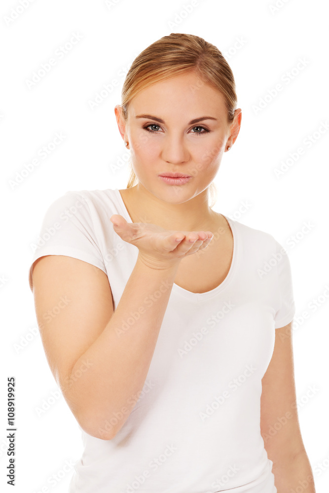 Young woman sending a kiss Young woman sending a kiss