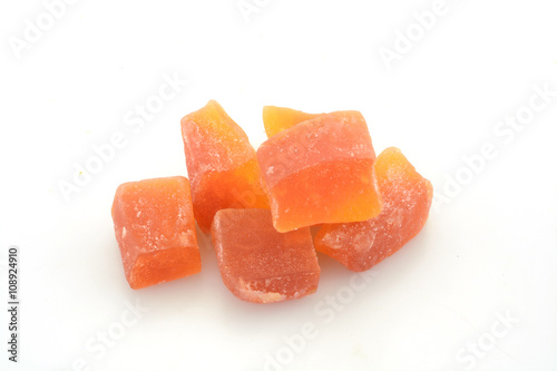 Dried papaya sticks over white background 