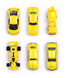 Yellow toy cars on white background