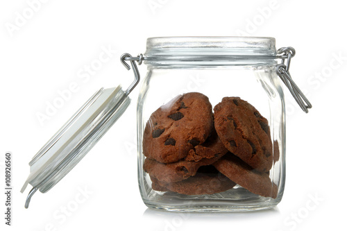 Cuadro en lienzo transparent open a jar with delicious cookies with raisins isolated on white bac