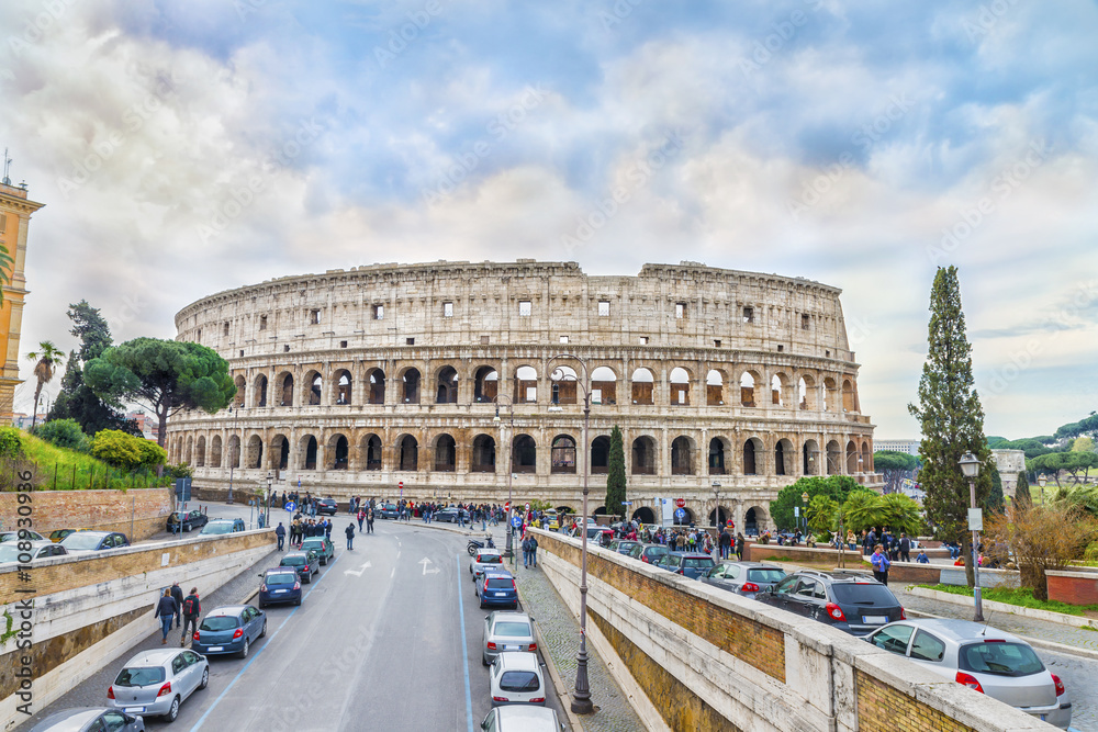 The Great Roman Colosseum (Coliseum, Colosseo) also known as the Flavian Amphitheatre.This mega structure is one of the wonders of the world.Scenic panoramic view on the  famous landmark.Italy.Europe.