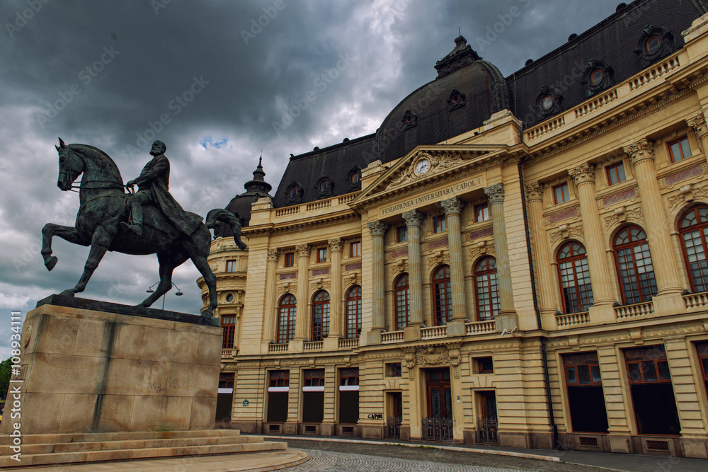 Bucharest cityscape: Central University Library of Bucharest with the Statue of King Carol I.