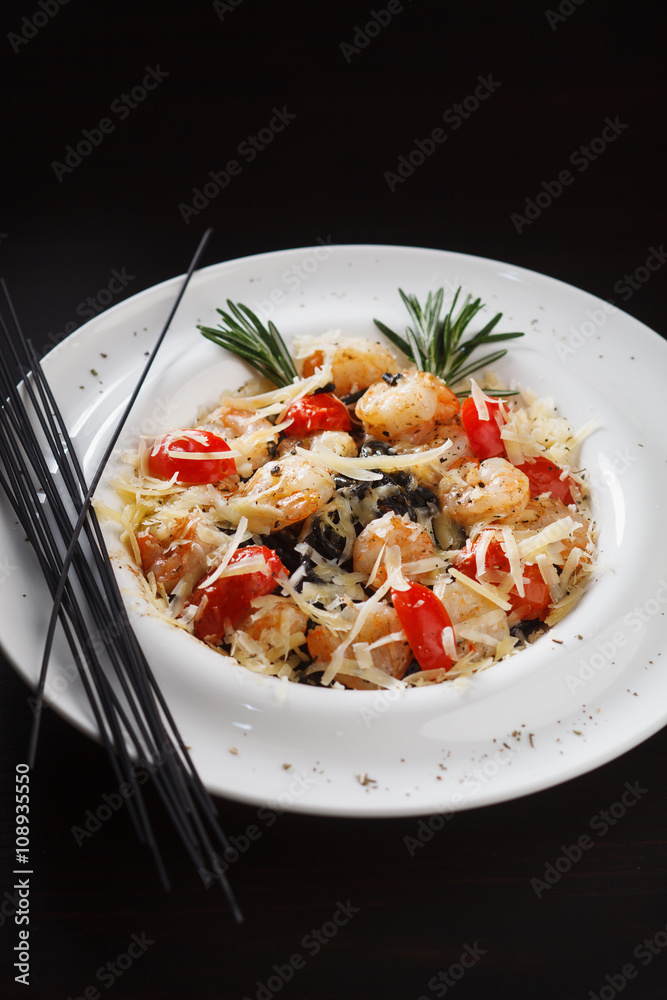 Black spaghetti with shrimps and vegetables Black spaghetti with shrimps and vegetables