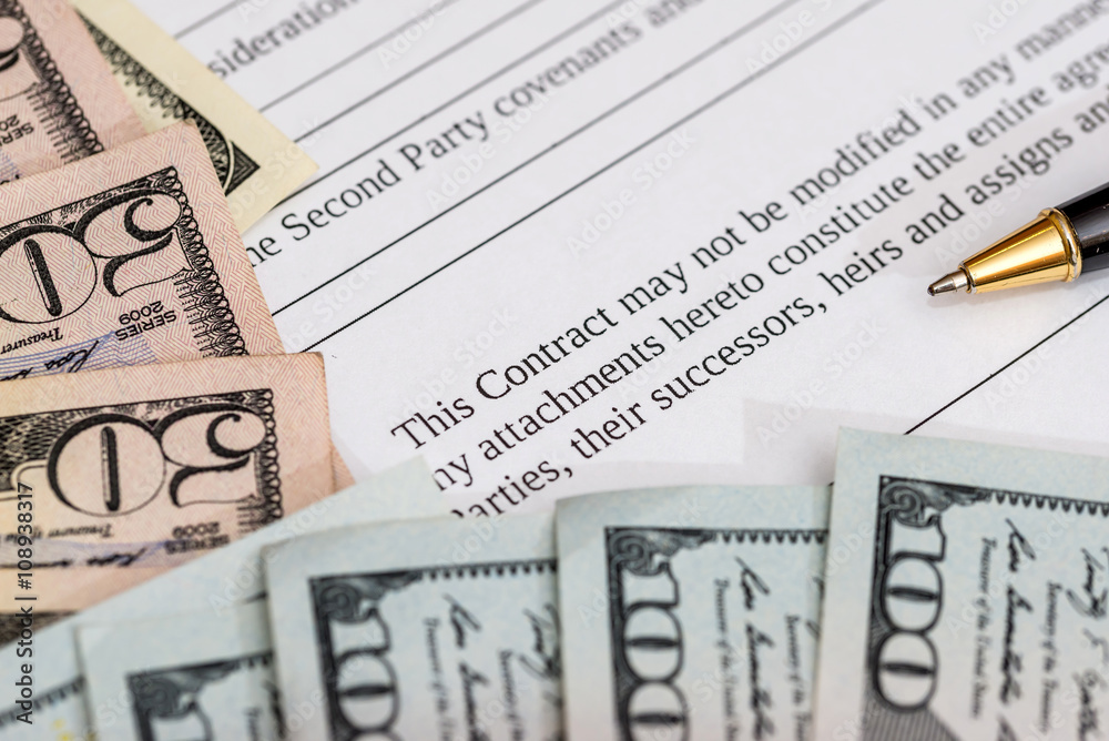blank contract, pen and us dollar blank contract, pen and us dollar