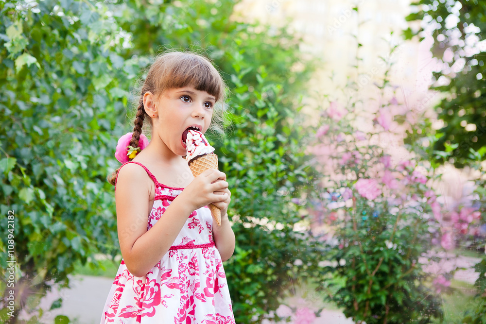 girl with pigtails eating ice cream in a cone girl with pigtails eating ice cream in a cone