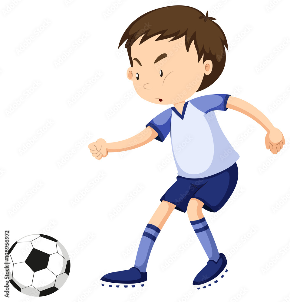 Boy playing soccer alone Boy playing soccer alone
