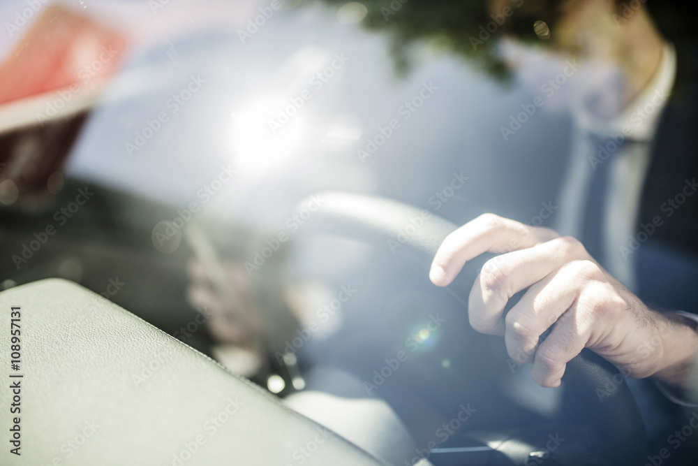 Close-up of businessman in car Close-up of businessman in car